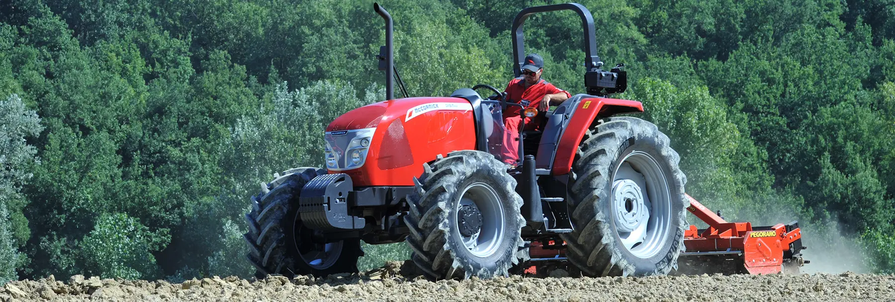 Tractor and implement working together in the field